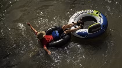 Nearly 200 million people in the US are under heat or flood advisories