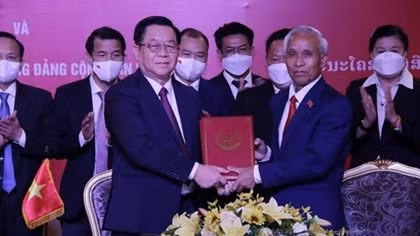 Vietnam, Laos step up Party cooperation