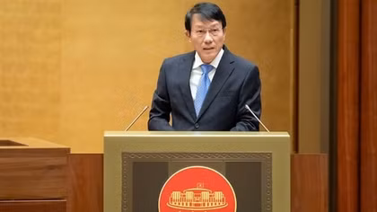 Minister Luong Tam Quang presents report on four draft laws to National Assembly